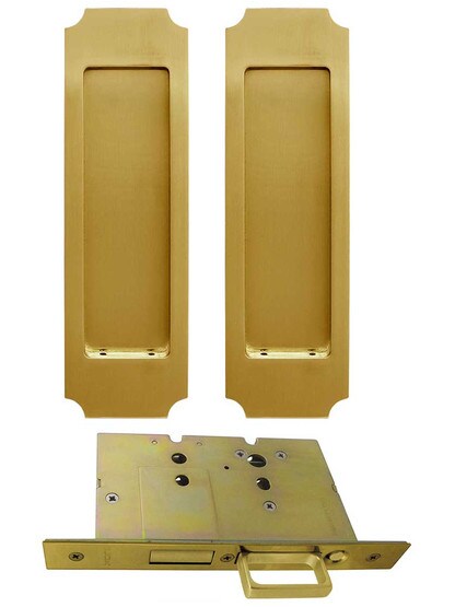 Premium Dummy Pocket-Door Mortise Lock Set with Chamfered Corner Pulls in Aged Brass.